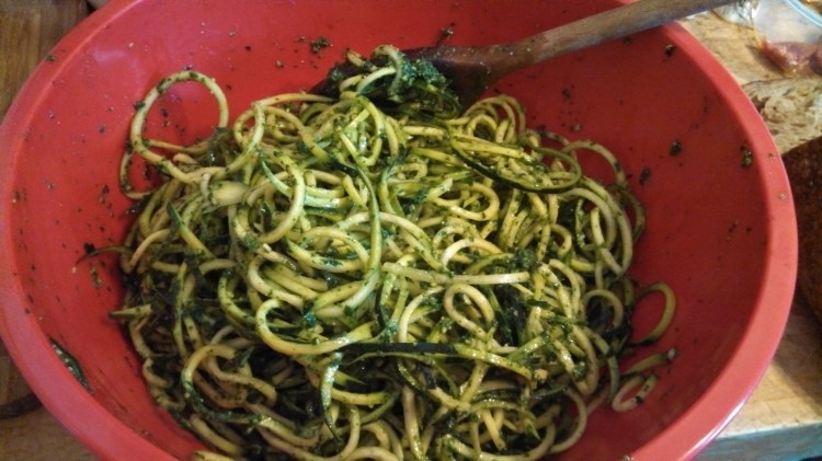 Zucchini pasta tossed with parsley pesto